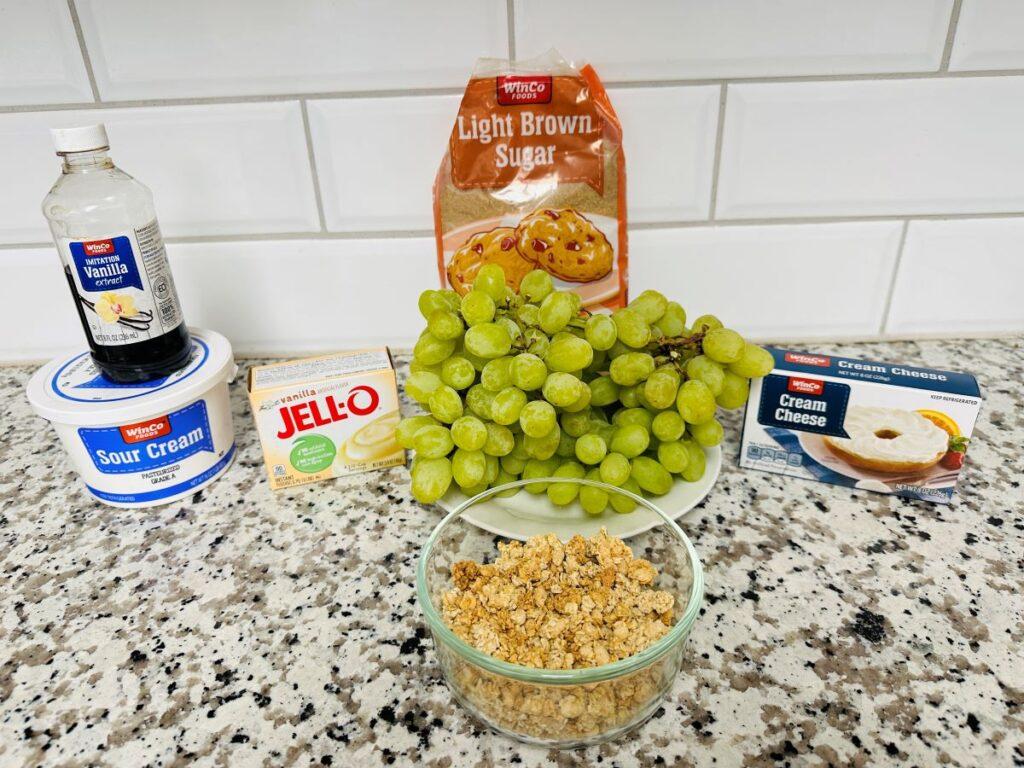 Ingredients for grape salad on counter.