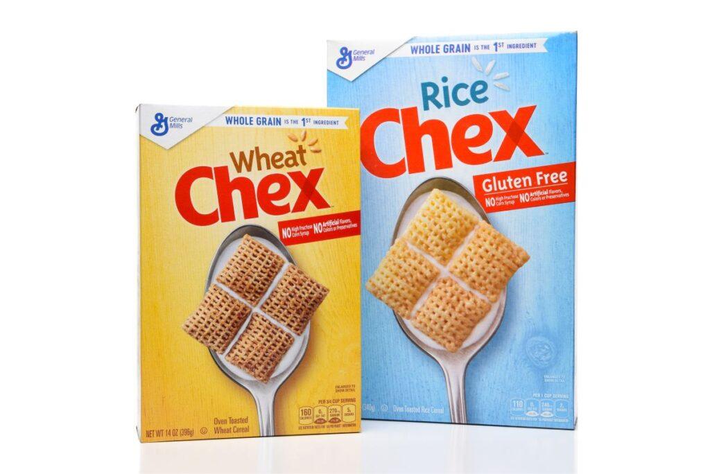 A box of Wheat Chex and a box of Rice Chex cereal.