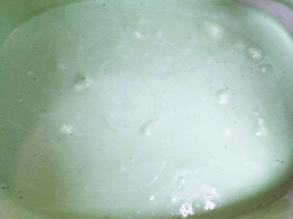 Melted light green marshmallows.