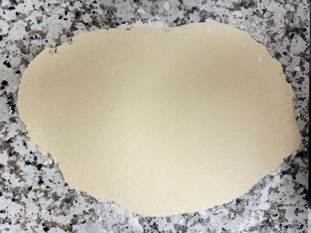 Rolled out dough on counter.