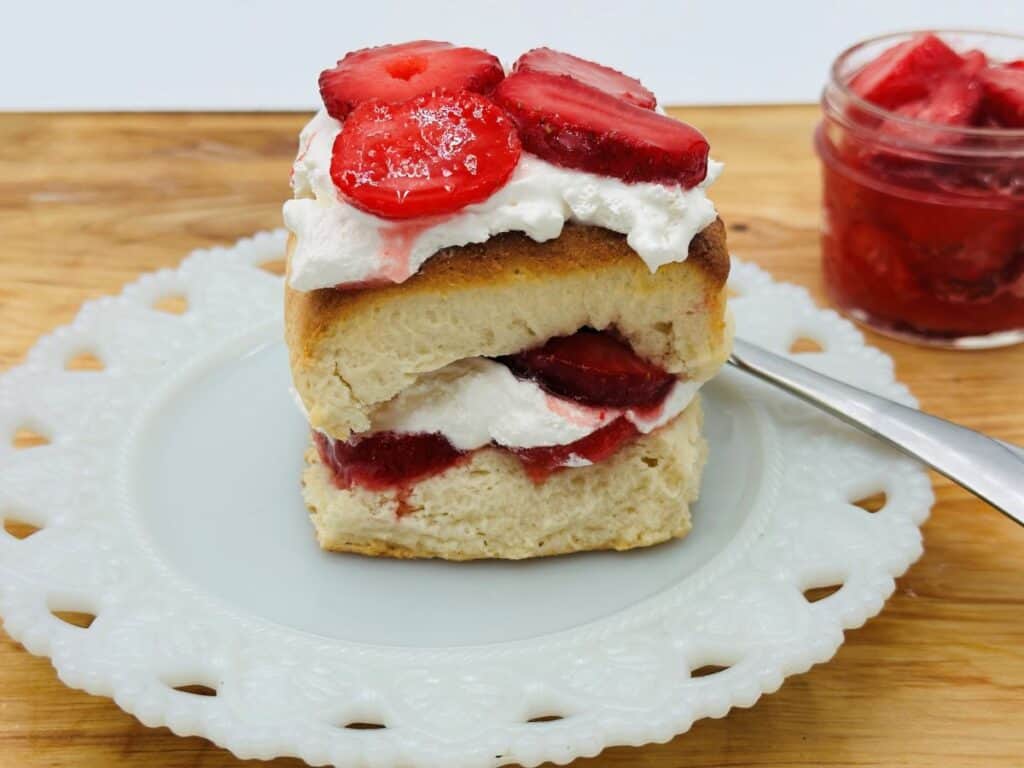 Strawberry shortcake on white plate.