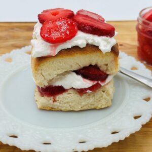 Strawberry shortcake on white plate.