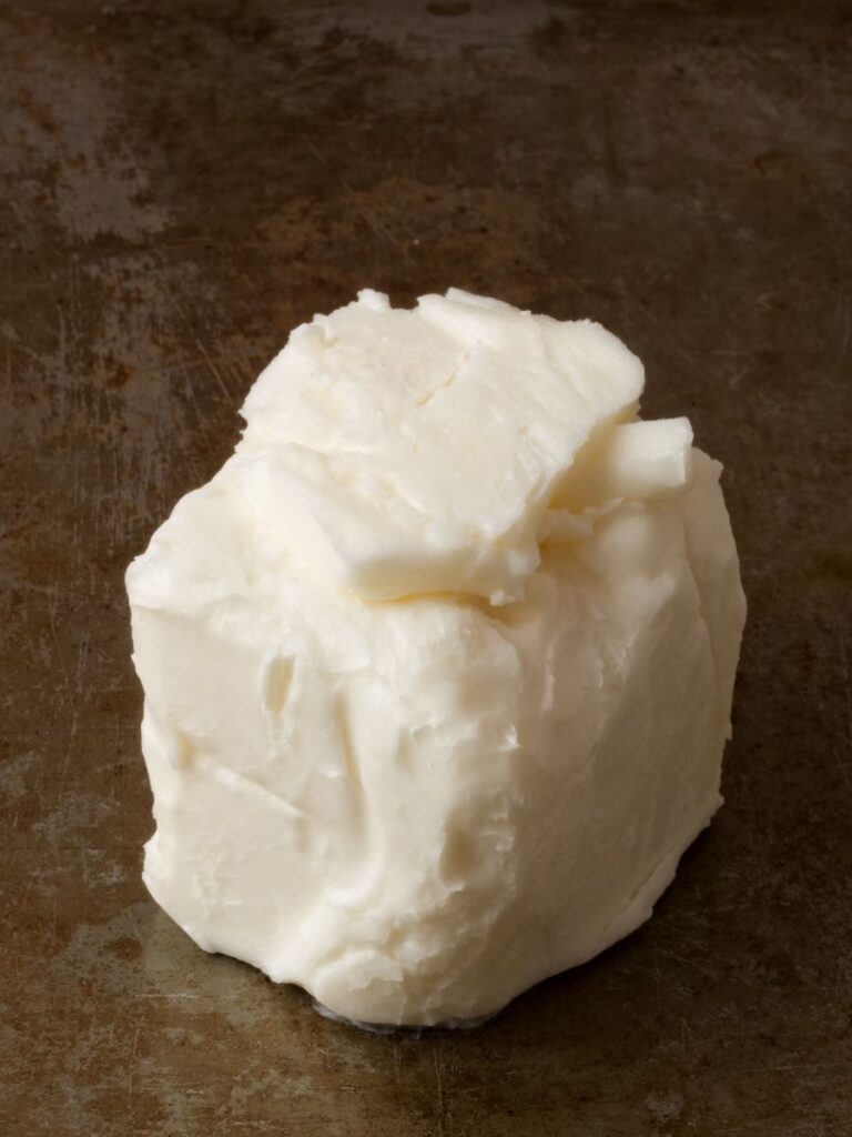 White shortening in metal pan.