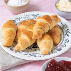 Top view of plate of croissants.