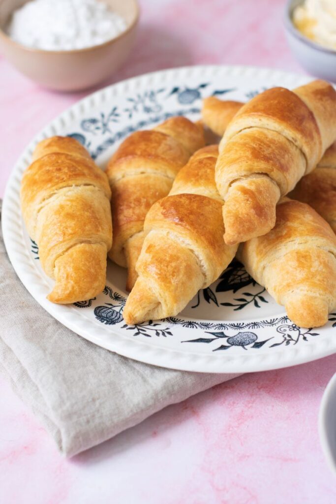 Top view of plate of croissants.