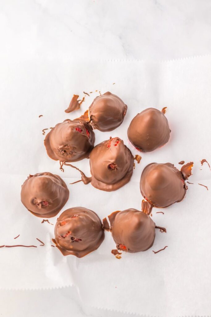 Overhead view of chocolate dipped strawberries.