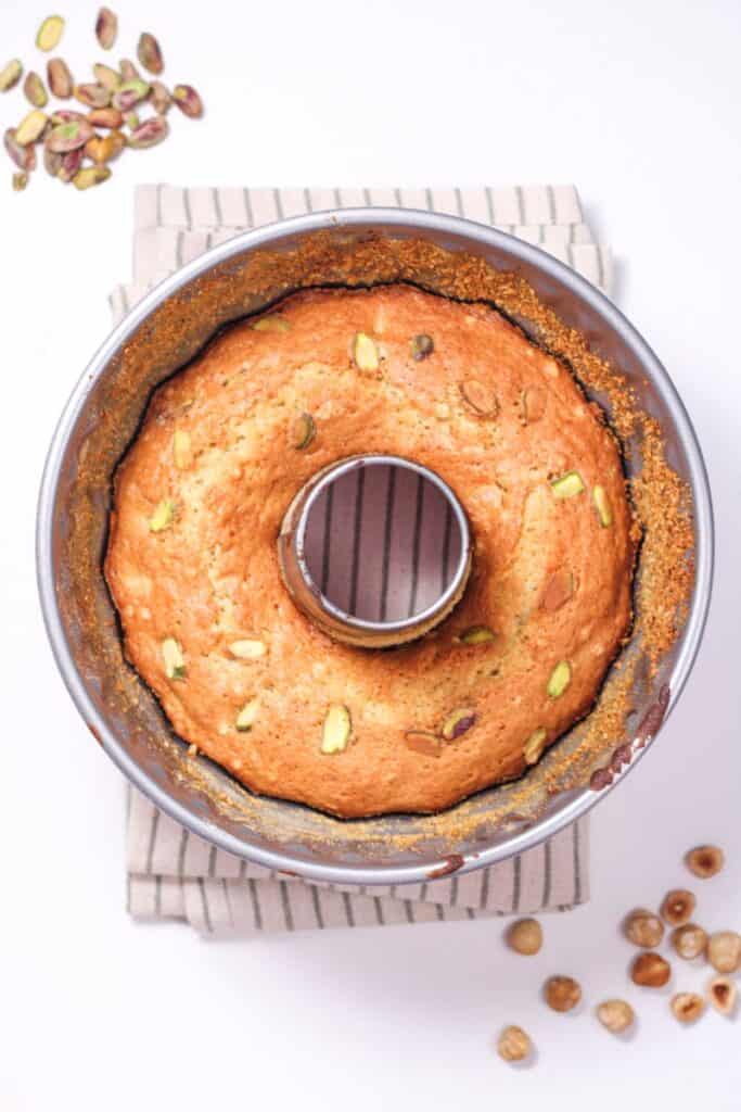 Overhead view of Bundt cake pan with cooked cake.