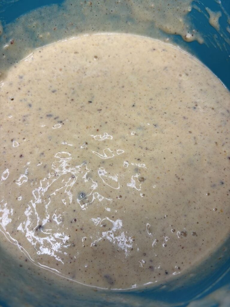 A bowl of beige, speckled batter.